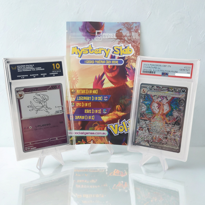 Pokémon trading cards with a 'Mystery Slab' packaging on a white background