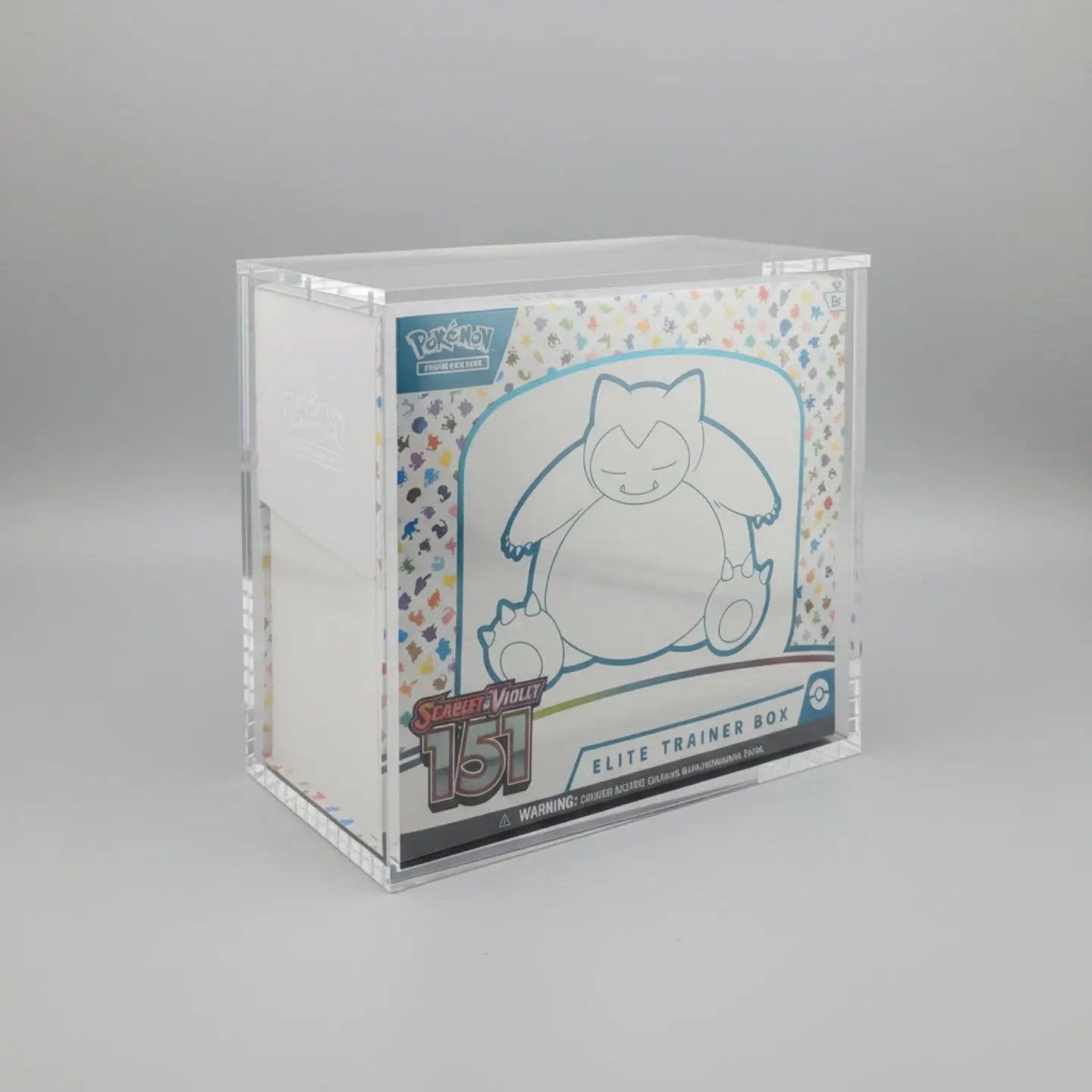 Pokémon trading card in a clear protective case on a dark surface