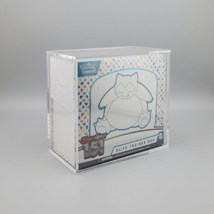 Pokémon trading card in a clear protective case on a dark surface