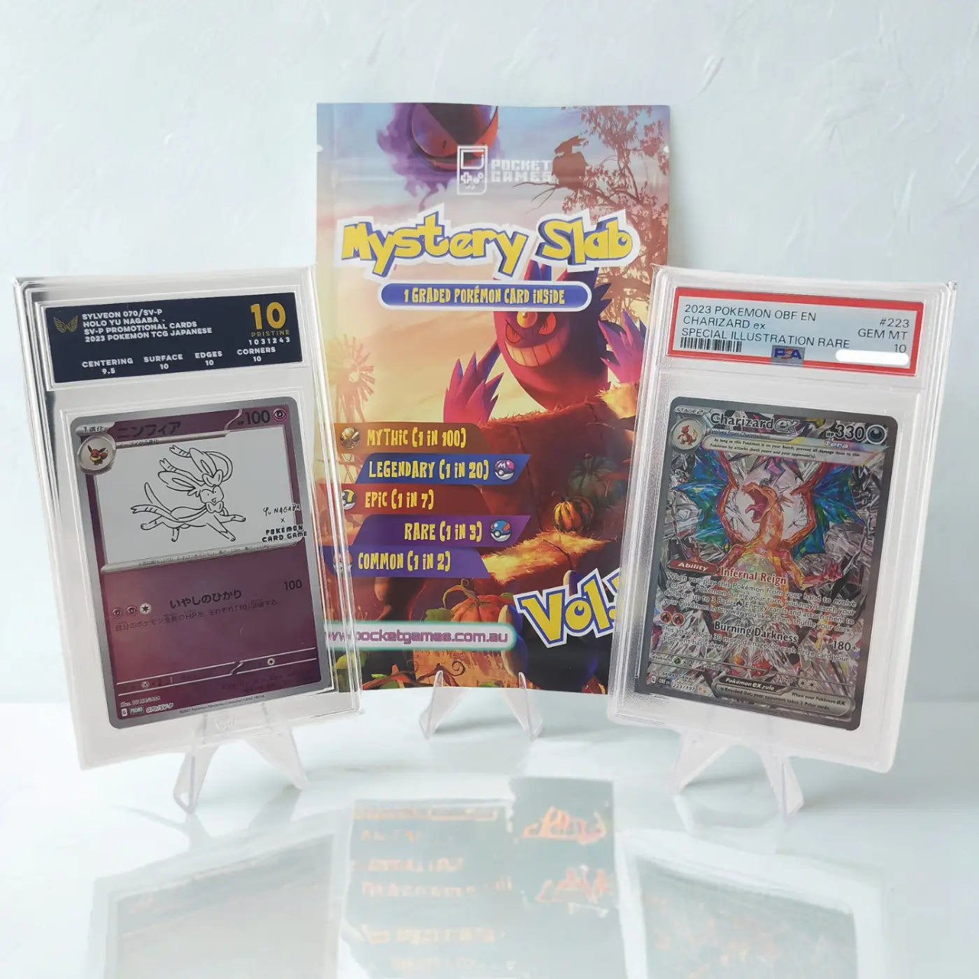 Pokémon trading cards with a 'Mystery Slab' packaging on a white background