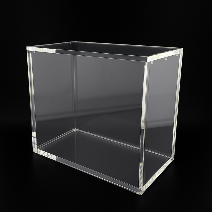 Clear acrylic cube on a black background