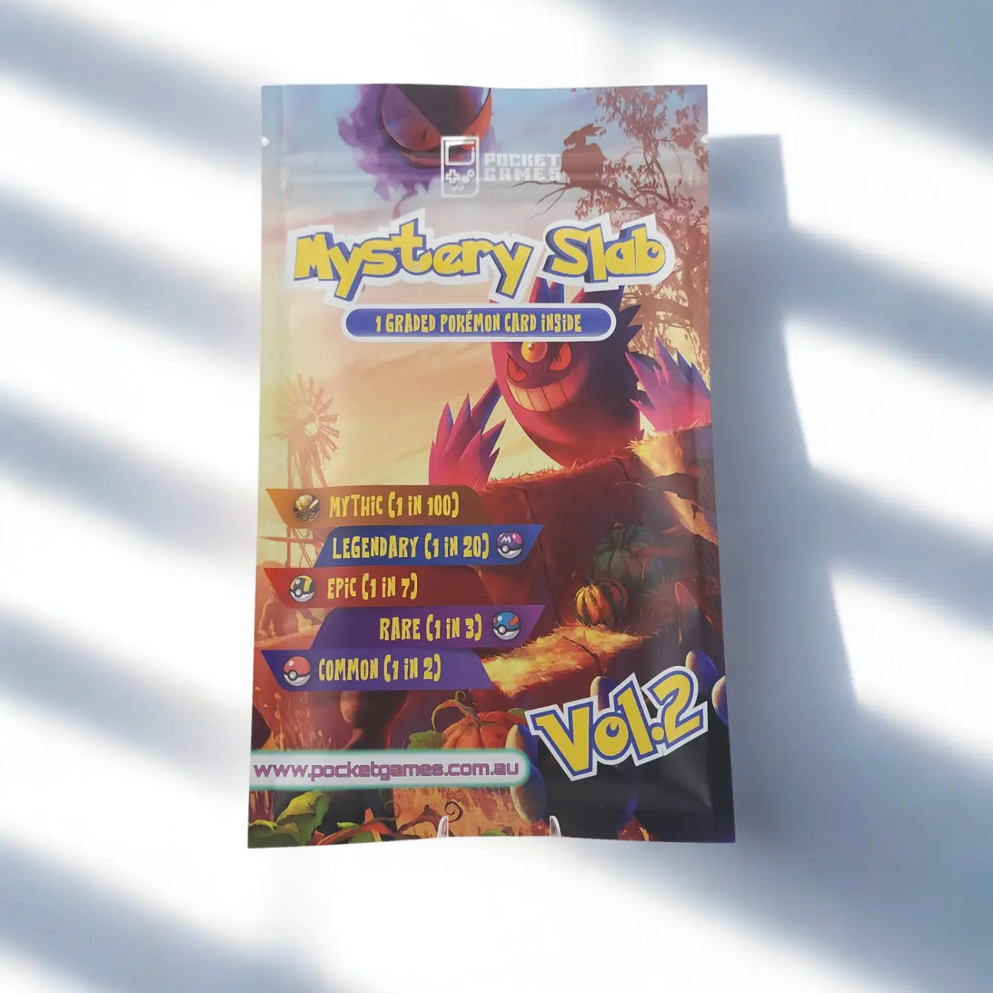 Mystery slab packaging for a graded Pokémon card release on a light gray background