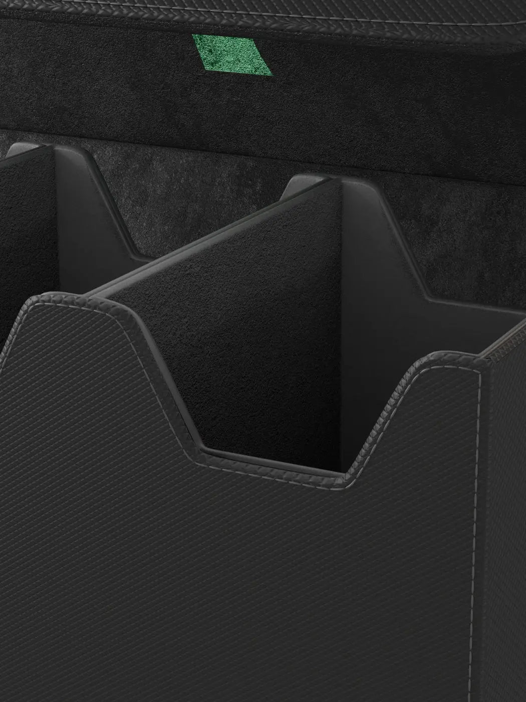 Collector's Series Graded Card Storage Case - Large Close-up of a black car storage compartment with a green label.