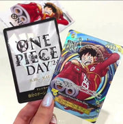 One Piece Day 24 cards held by a hand on a white background