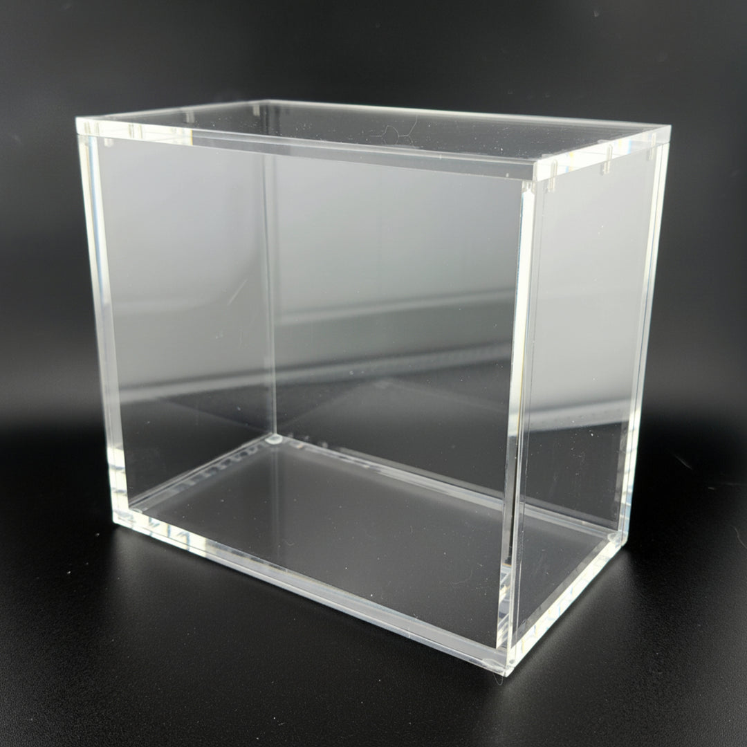 Clear acrylic block on a black background
