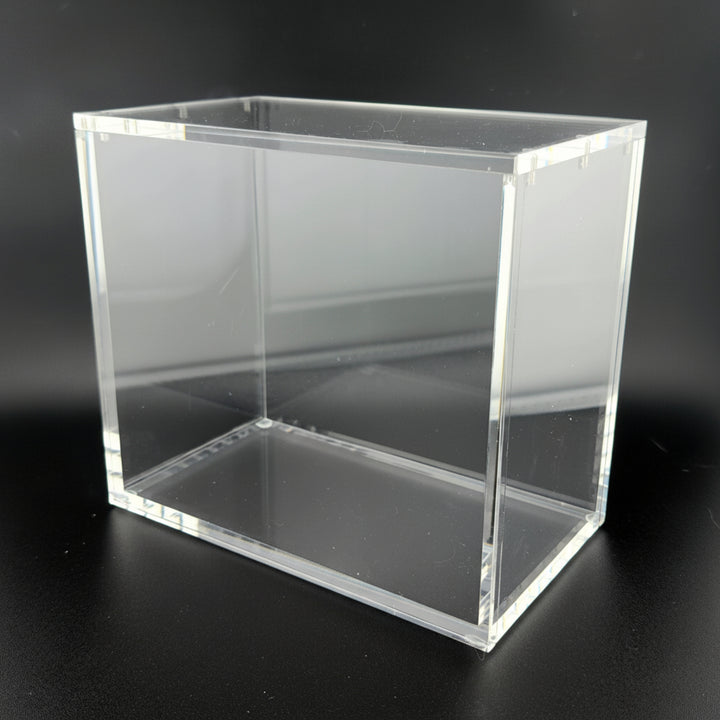Clear acrylic block on a black background